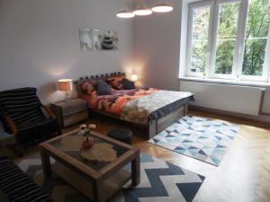 Posedenie v ubytovaní Apartament Orchidea