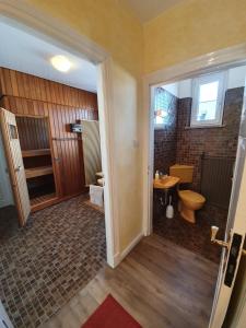 Koupelna v ubytování Stadtvilla Marie Varel Dangast 4 Personen mit Sauna