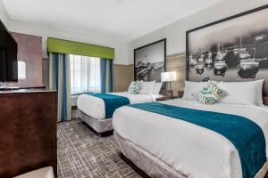 מיטה או מיטות בחדר ב-The Freeport Hotel, Ascend Hotel Collection