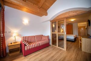 Postel nebo postele na pokoji v ubytování Astor Suites B&B