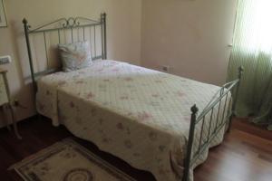 A bed or beds in a room at Casa Sofia