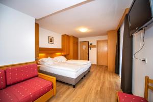 Postel nebo postele na pokoji v ubytování Astor Suites B&B