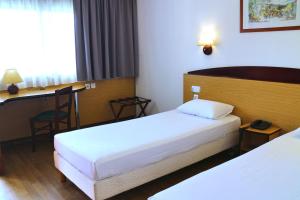 Letto o letti in una camera di Travelodge Barcelona del Vallés
