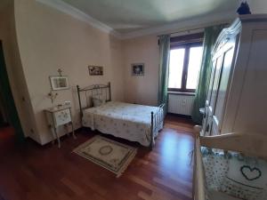 A bed or beds in a room at Casa Sofia