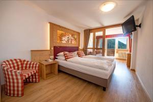 Postel nebo postele na pokoji v ubytování Astor Suites B&B