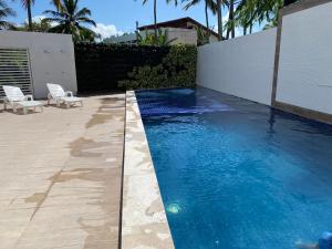 Der Swimmingpool an oder in der Nähe von Condomínio Solar Porto Rico AP 3