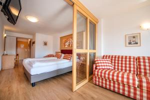 Postel nebo postele na pokoji v ubytování Astor Suites B&B