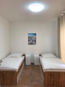 Postel nebo postele na pokoji v ubytování Pension Chen