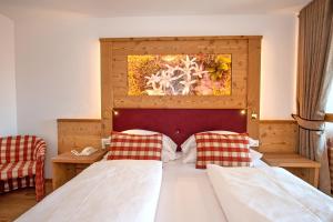 Postel nebo postele na pokoji v ubytování Astor Suites B&B