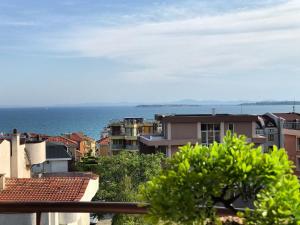 a view of the ocean from a city at Guest House Val and Kate in Sveti Vlas