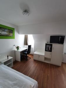 Postel nebo postele na pokoji v ubytování Hotel Alte Post
