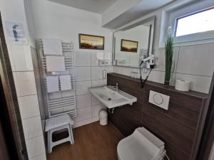 Koupelna v ubytování Hotel Alte Post