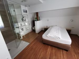 Postel nebo postele na pokoji v ubytování Hotel Alte Post