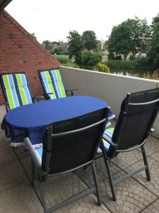 Ein Balkon oder eine Terrasse in der Unterkunft Ferienwohnung "Sielblick" in Dornumersiel