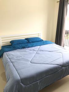 Ένα ή περισσότερα κρεβάτια σε δωμάτιο στο Impact MT House