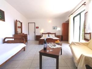 Postel nebo postele na pokoji v ubytování George Michalas (Vivaria Apartments)