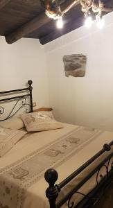 En eller flere senge i et værelse på IL SOGNO DI STINTINO