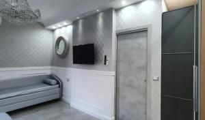 A television and/or entertainment centre at SILVER SUITE