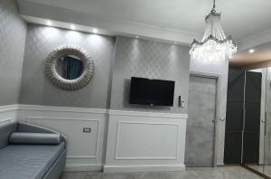 A television and/or entertainment centre at SILVER SUITE