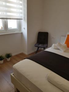 Posteľ alebo postele v izbe v ubytovaní Marina Rijeka Center apartments