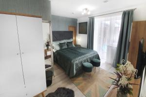 Postel nebo postele na pokoji v ubytování Casa PERLA