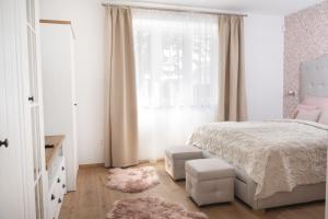 Postel nebo postele na pokoji v ubytování Casa PERLA
