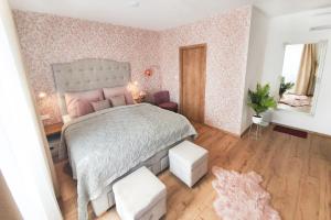 Postel nebo postele na pokoji v ubytování Casa PERLA
