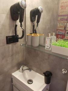 Kúpeľňa v ubytovaní Mikro Apartament Solo na Starówce 8m2