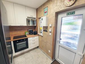Kuchyň nebo kuchyňský kout v ubytování Casa PERLA