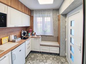 Kuchyň nebo kuchyňský kout v ubytování Casa PERLA