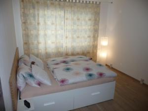 Posteľ alebo postele v izbe v ubytovaní Apartman Q11