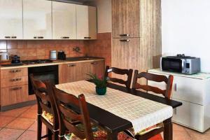 Kuchyň nebo kuchyňský kout v ubytování MONTE Beach Apartments