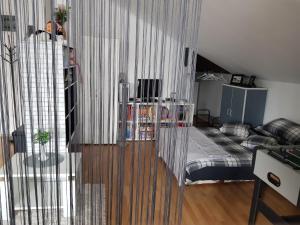 Postel nebo postele na pokoji v ubytování Apartman Atelier