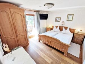 Ein Bett oder Betten in einem Zimmer der Unterkunft Haus Marienheim