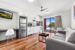 Kuchyň nebo kuchyňský kout v ubytování Essence Apartments Chermside