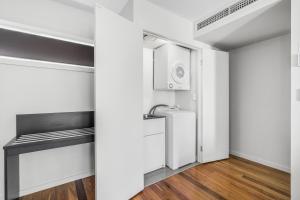 Kuchyň nebo kuchyňský kout v ubytování Essence Apartments Chermside