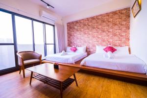 黑琵軼棧湖濱旅宿 K&B Happy Hostel 객실 침대