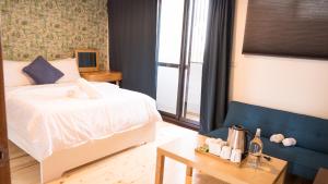黑琵軼棧湖濱旅宿 K&B Happy Hostel 객실 침대