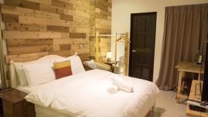 黑琵軼棧湖濱旅宿 K&B Happy Hostel 객실 침대