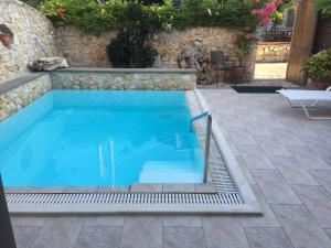 A piscina em ou perto de Villa Lithos Parga