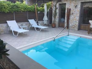 A piscina em ou perto de Villa Lithos Parga