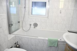Koupelna v ubytování Hotel Elite