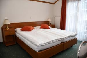 Postel nebo postele na pokoji v ubytování Hotel Elite