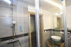 Koupelna v ubytování Hotel Elite