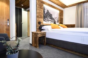 Postel nebo postele na pokoji v ubytování Hotel Elite