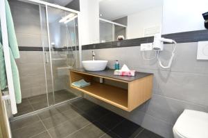 Koupelna v ubytování Hotel Elite