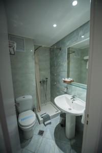 Koupelna v ubytování Hotel Olympos