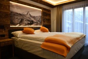 Postel nebo postele na pokoji v ubytování Hotel Elite