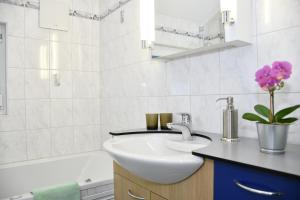 Koupelna v ubytování Hotel Elite