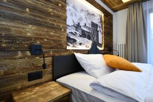 Postel nebo postele na pokoji v ubytování Hotel Elite